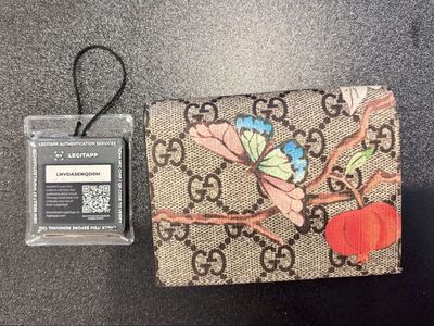 Gucci monogram canvas wallet