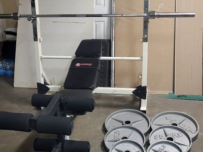 Bench and 235 pounds of weights