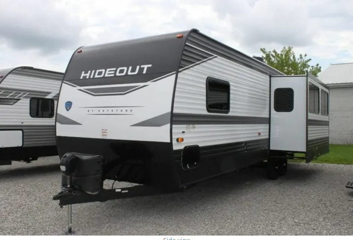 2022 Keystone Hideout 28RKSWE Travel Trailer - 33' Rear Kitchen, Solar & Lithium Upgrades, Sleeps 6