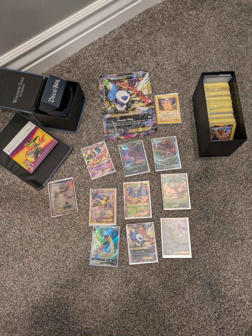 M Absol EX Mega Disaster Wing X Y 63 Pokemon Card LVL 210 and card other cards.