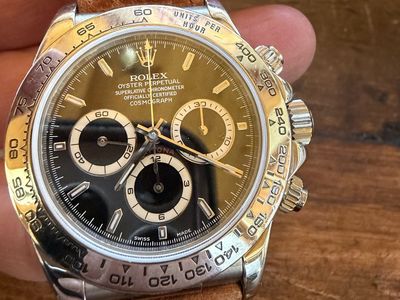 Rolex Oyster Perpetual Cosmograph Daytona Watch with Brown Leather Strap