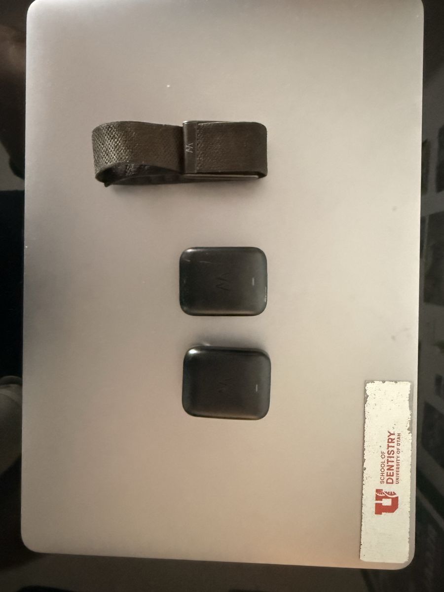 2 whoop charging pucks + band