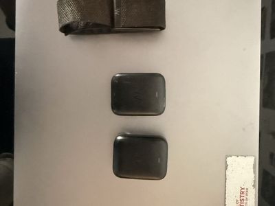2 whoop charging pucks + band