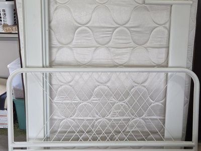 Full size metal frame and mattress.