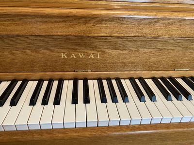 Kawai Console Piano in a Beautiful Satin Oak Finish