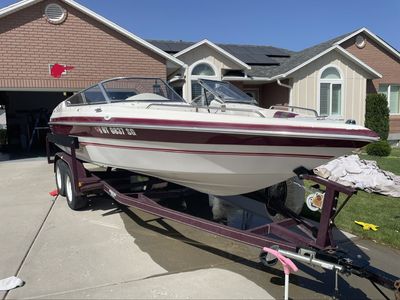 1997 Reinell ski Boat with Trailer - Covered, White and Maroon