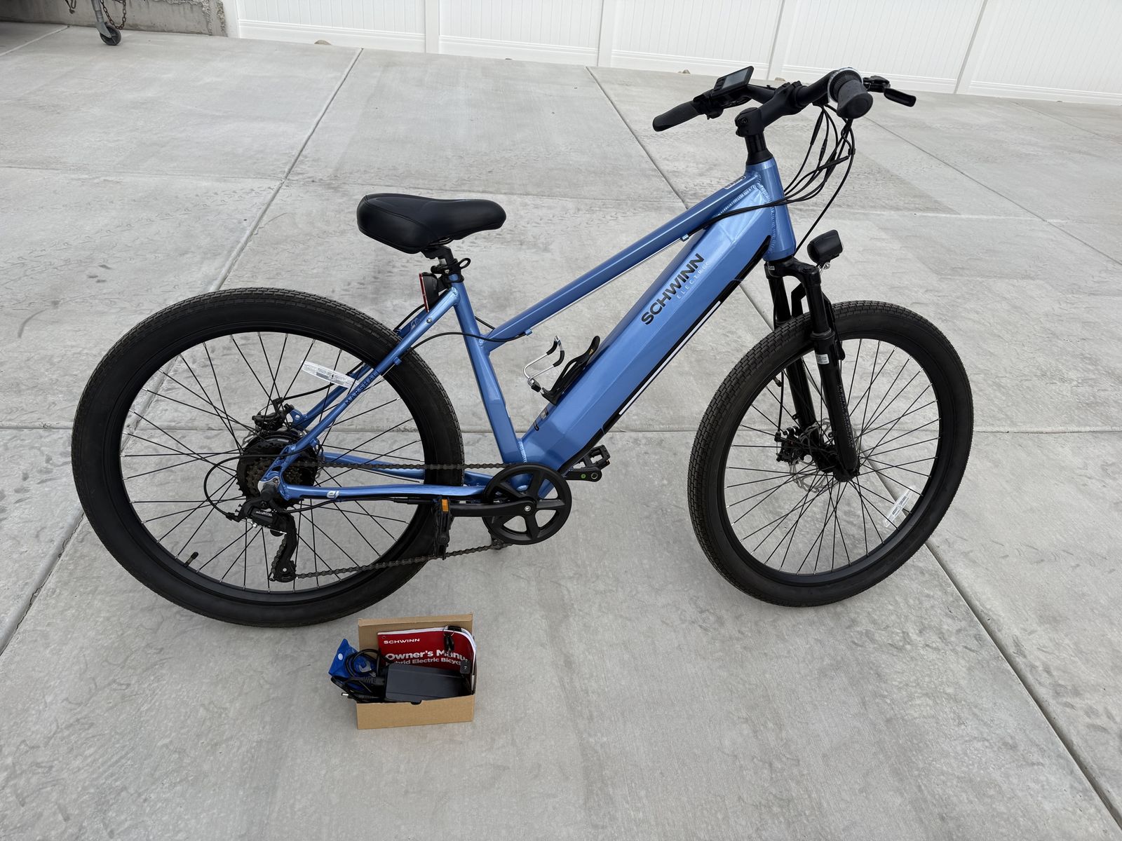Schwinn Marshall 26" Blue Electric Hybrid Bike with 7-Speed Twist Shifter