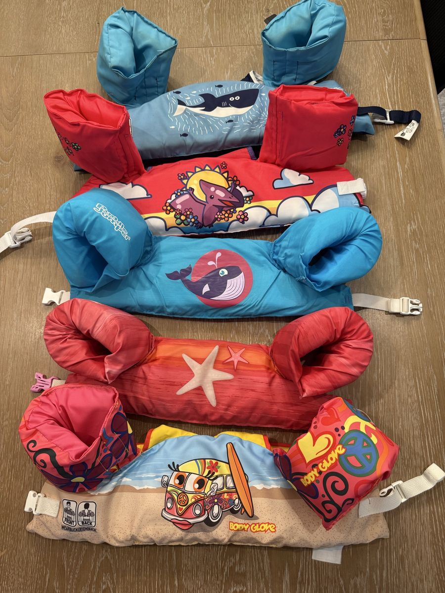 Kids Swim Life Vests & Puddle Jumpers  $5