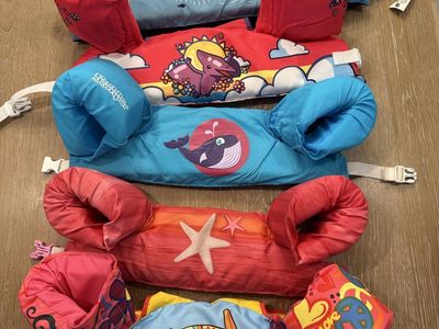 Kids Swim Life Vests & Puddle Jumpers $5
