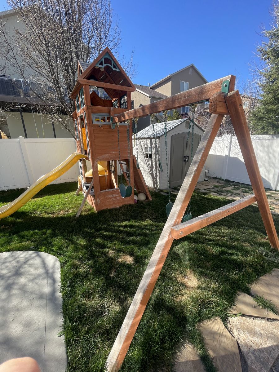 wood playhouse-swing set