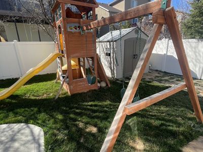 wood playhouse-swing set