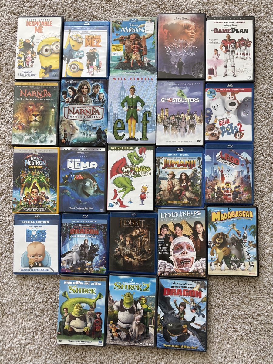 Kid’s DVD/BluRay Collection, includes Elf, Shrek, Shrek II, How to Train Your Dragon, Finding Nemo, and Moana.