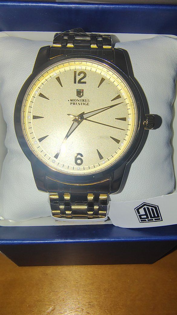 Montres Prestige Gold Tone Watch with Black and Gold Bracelet in Box