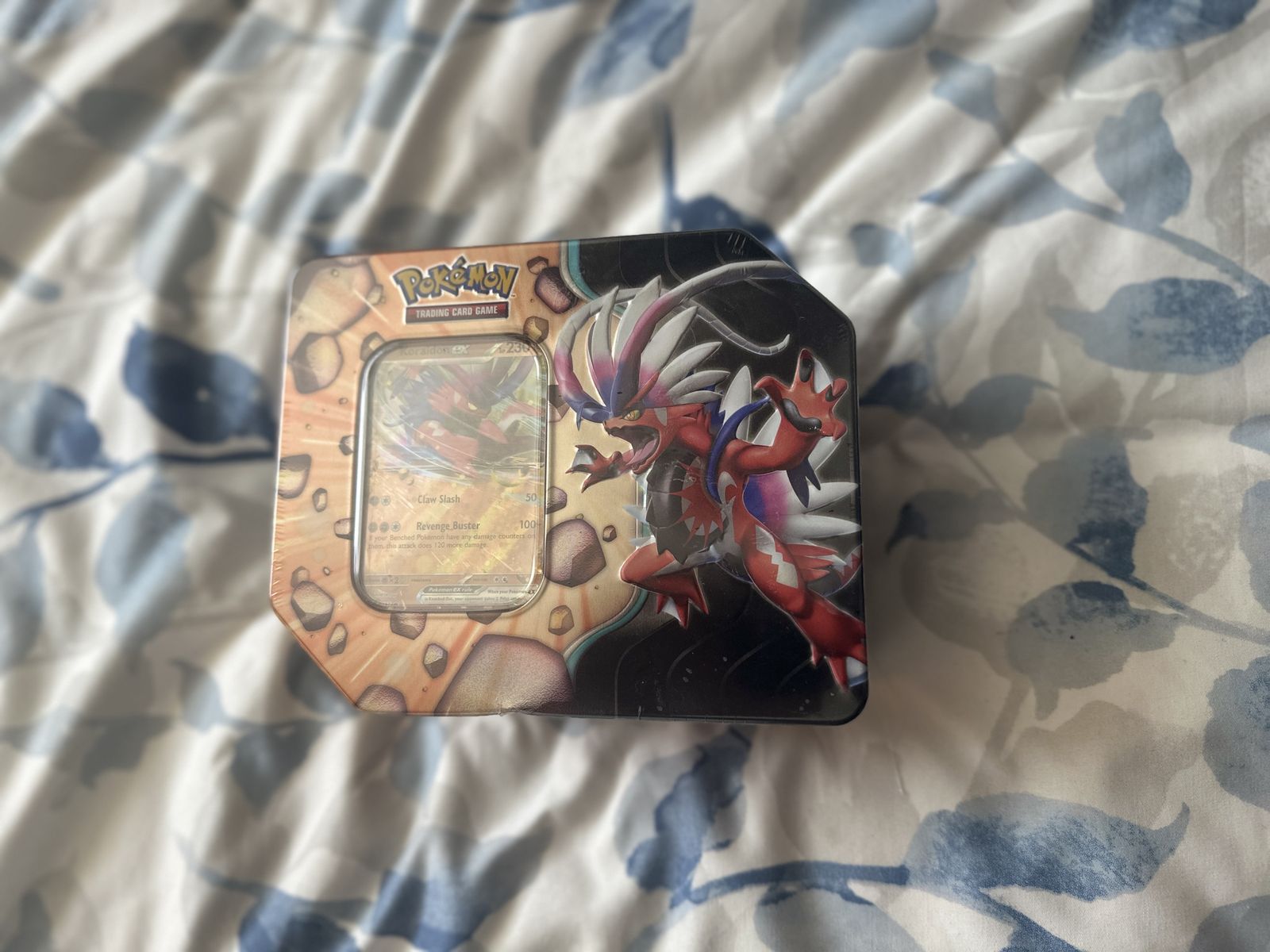 Pokemon TCG: Slashing Legends Tin with Koraidon ex Promo Card and 5 Booster Packs