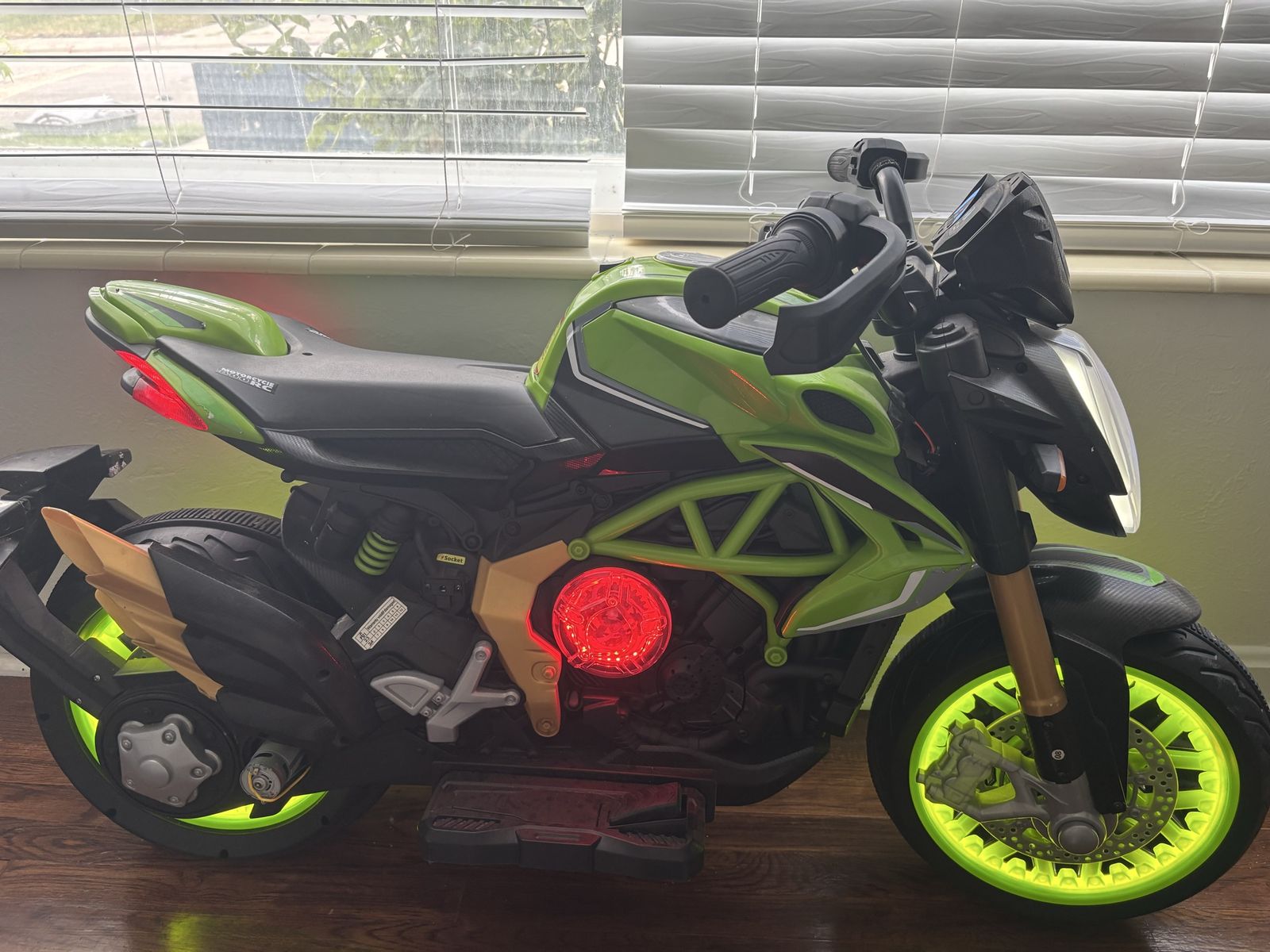 Kids Ride-On Electric Motorcycle - Green and Black Battery Powered Toy