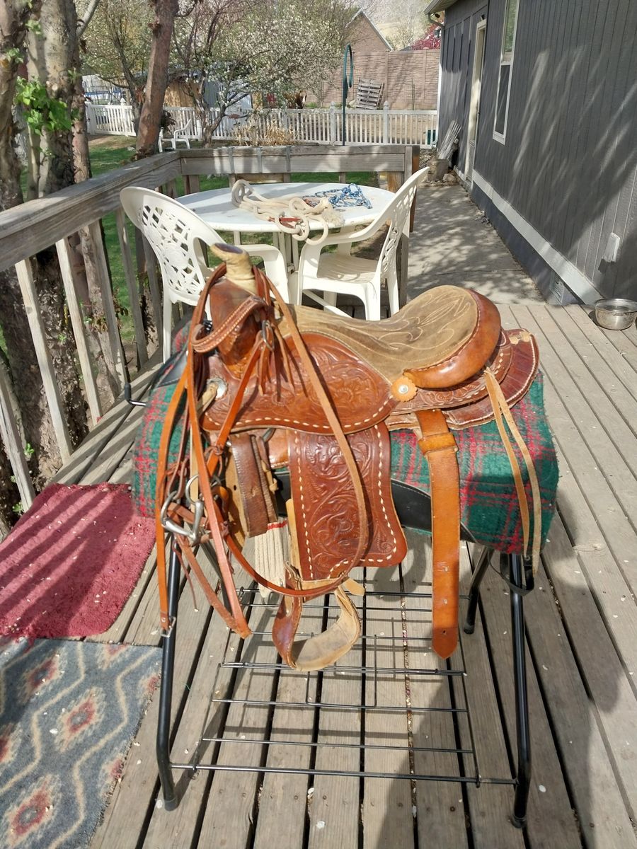 Pony Saddle-12" seat. Sale includes bridle, pad, cinch and saddle stand.