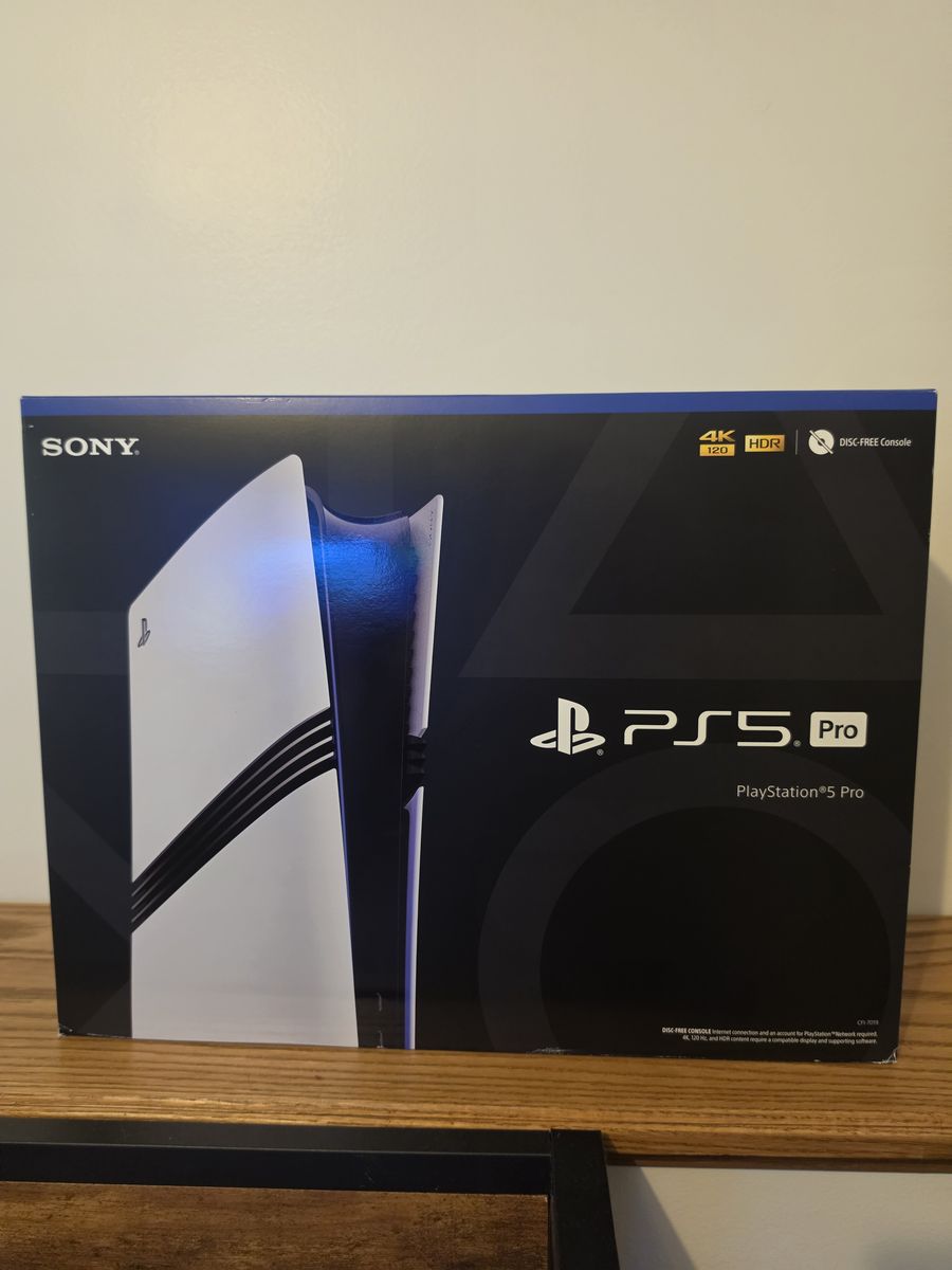 New ps5 pro with extra controller and charging dock 