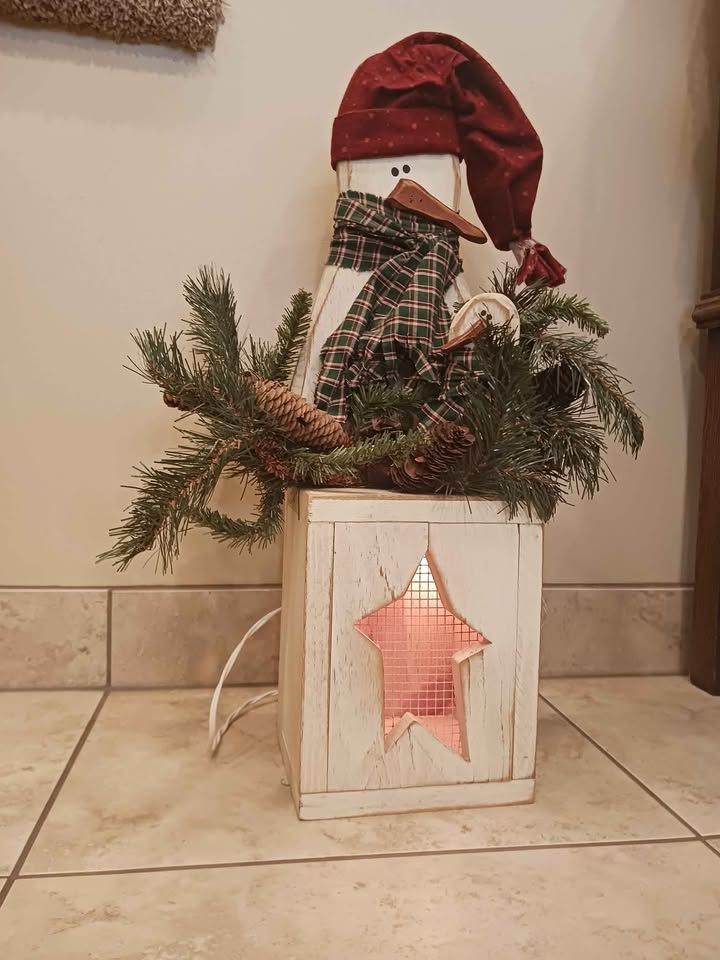 Handmade wooden snowman with light