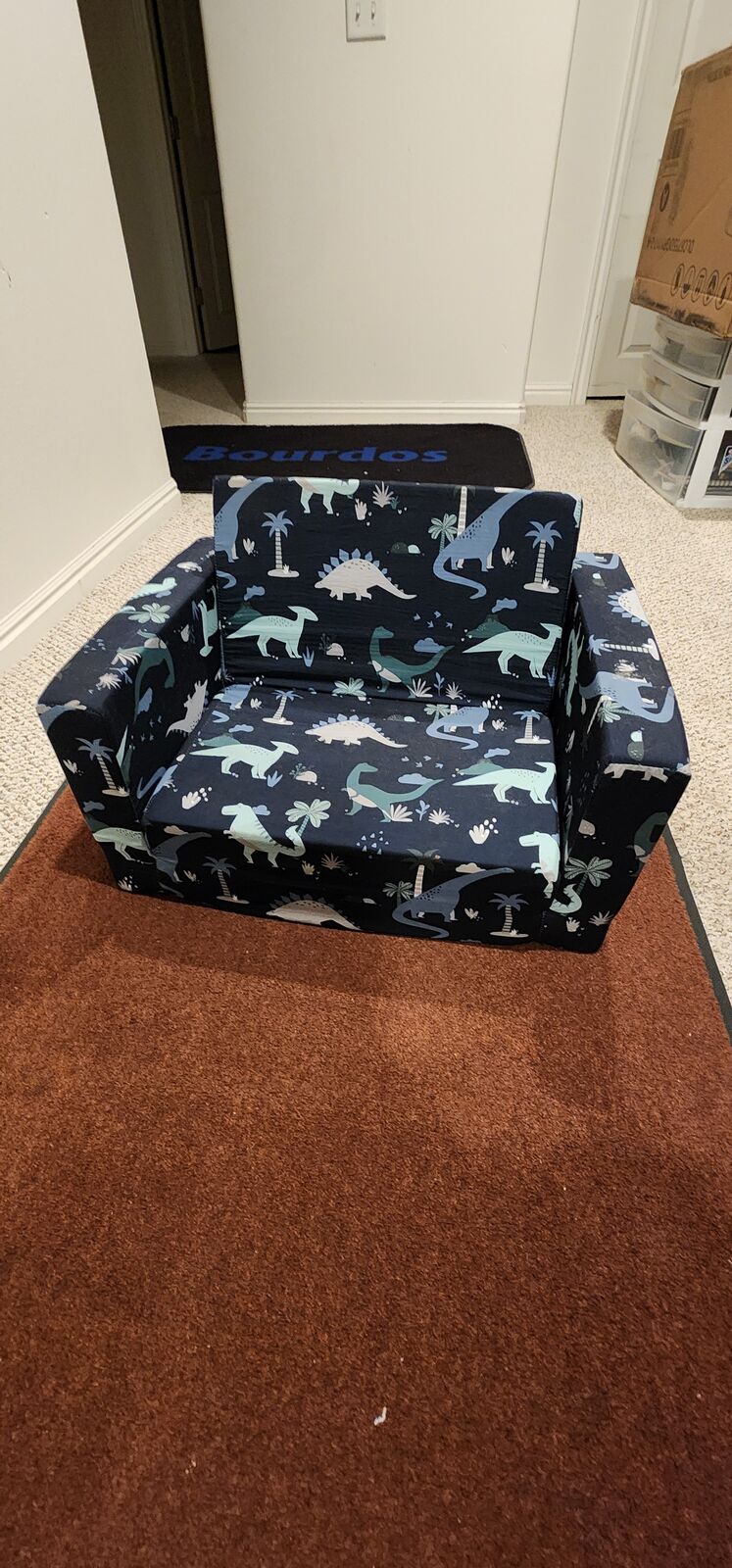 Ulax Furniture kids' 2-in-1 convertible flip-open sofa chair in a navy dinosaur pattern