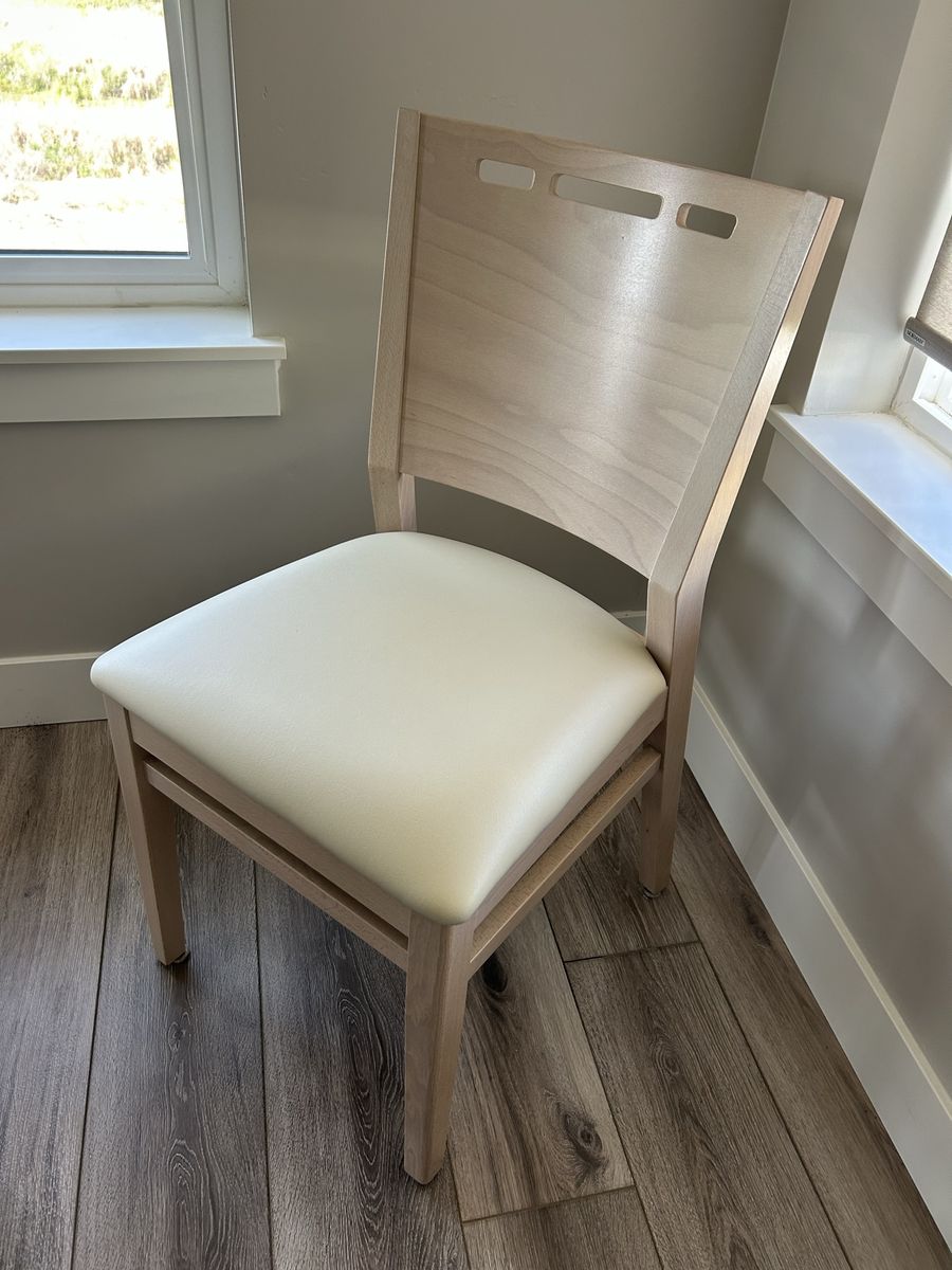 Contemporary European Beachwood Dining Chair with Cream Upholstered Seat - Sleek & Modern.