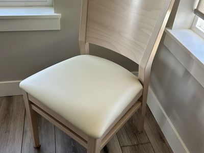 Contemporary European Beachwood Dining Chair with Cream Upholstered Seat - Sleek & Modern.