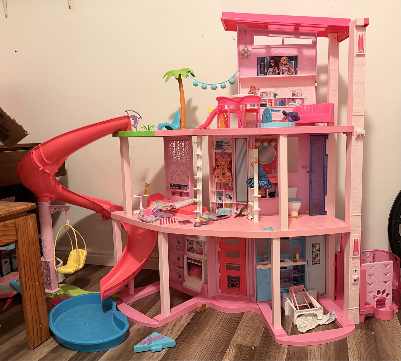 Barbie Dreamhouse with Slide, Pool, and Accessories