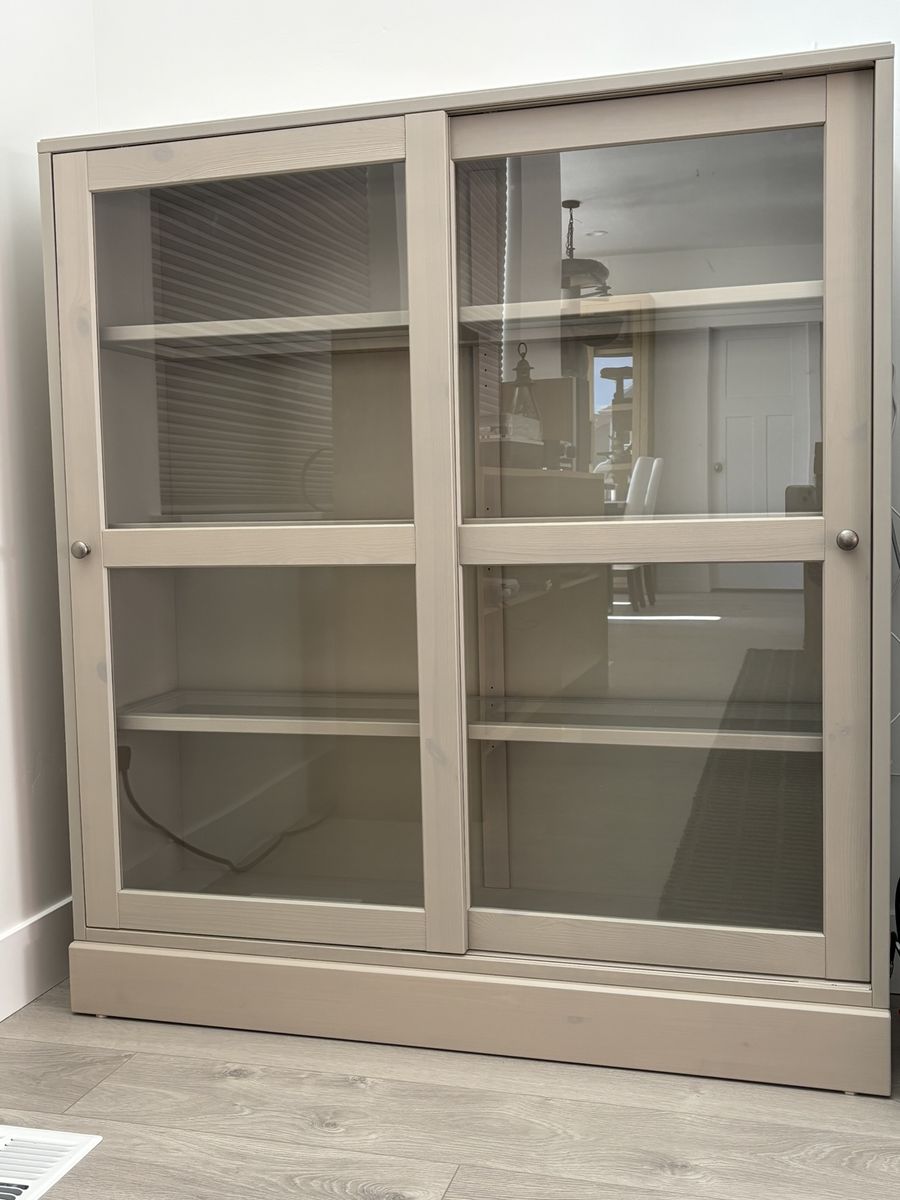 Selling two IKEA HAVSTA Glass-door cabinet with base