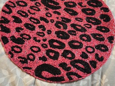 Luxurious Home 15" Round Beaded Placemat - Pink & Black Leopard Print, Polyester