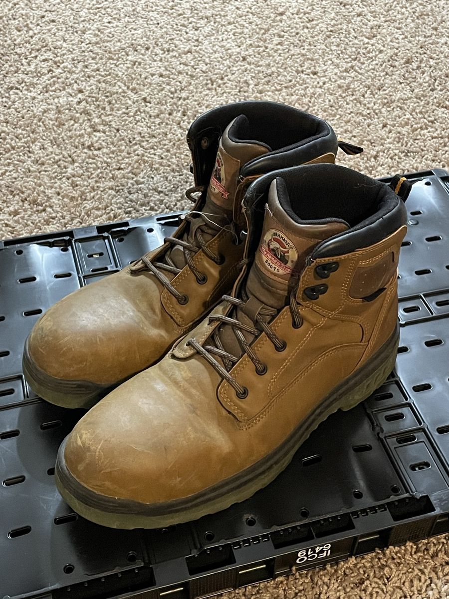 Very very lightly used work boots with steel toe.