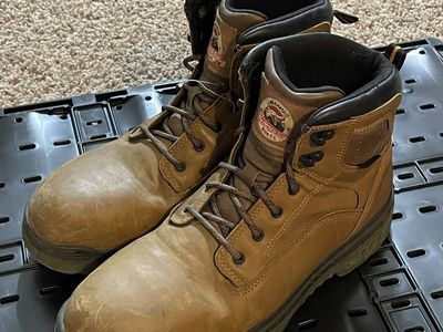 Very very lightly used work boots with steel toe.