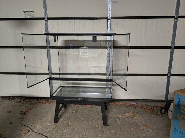 Reptile Enclosure with lighting, decor, hides, wood, etc