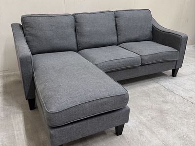 Free Delivery - Reversible Dark Gray Sectional Couch
