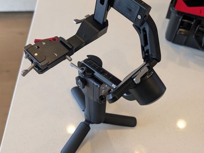 DJI RS 3 Mini 3-Axis Gimbal stabilizer for mirrorless camera, with hard shell carry case.