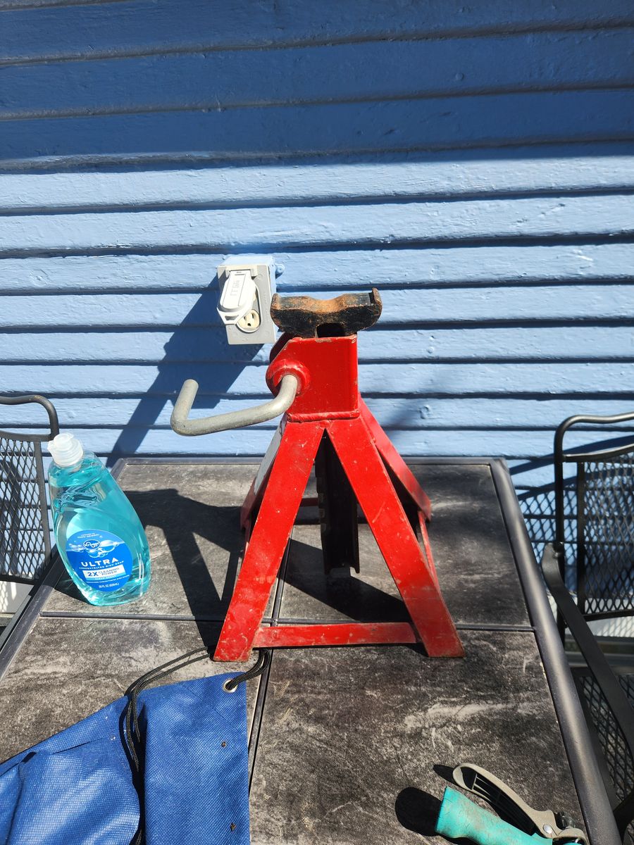 Large floor jack stand.  Works great.