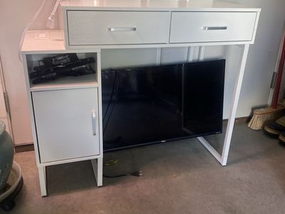 Children desk and 30” TClL Roku Tv with swivel wall mount