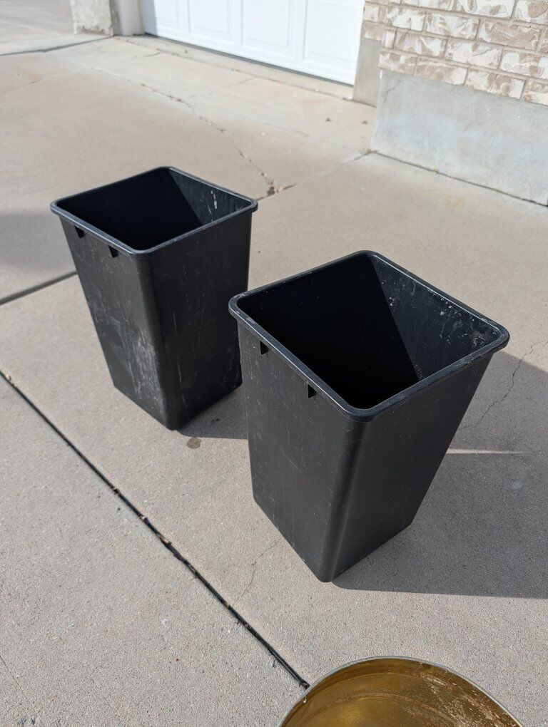 Mix of bins / buckets / cans