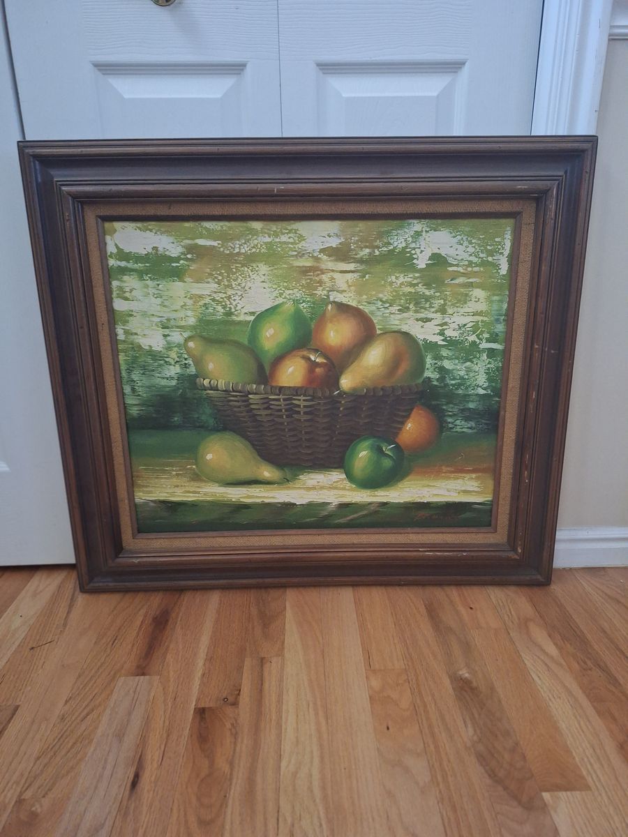 Vintage oil painting on canvas depicting a basket of fruit. 31.75" wide x 28.25" tall.