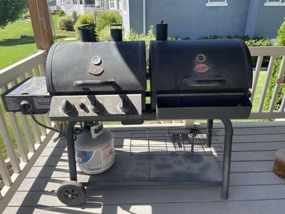 Char-Griller Duo 5050 Grill: Gas & Charcoal Grill with Side Burner, Cover Included. Located in Mapleton