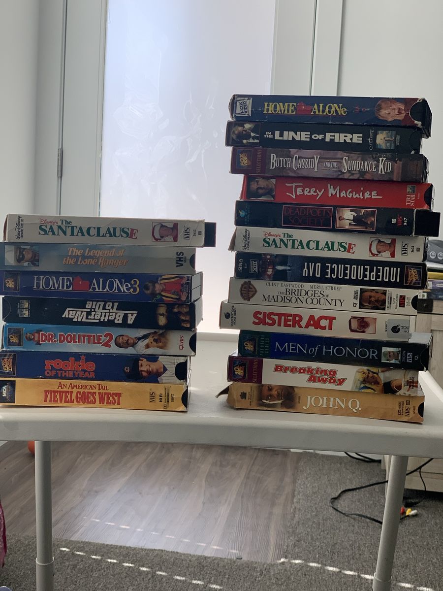 VHS Tapes: Pearl Harbor, Singin' in the Rain (Deluxe), The River, Sleeping Beauty, My Fair Lady,  Halloween H20, Jerry Maguire