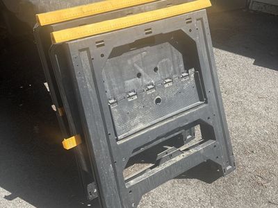 Pair of Folding Plastic Sawhorses with Yellow Measurement Top Rails