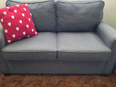 Loveseat sofa turns to twin bed