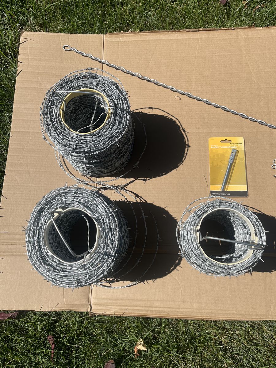 Barbed Wire 18-guage 4-point, approx 2200 ft. Unused. Plus some extras