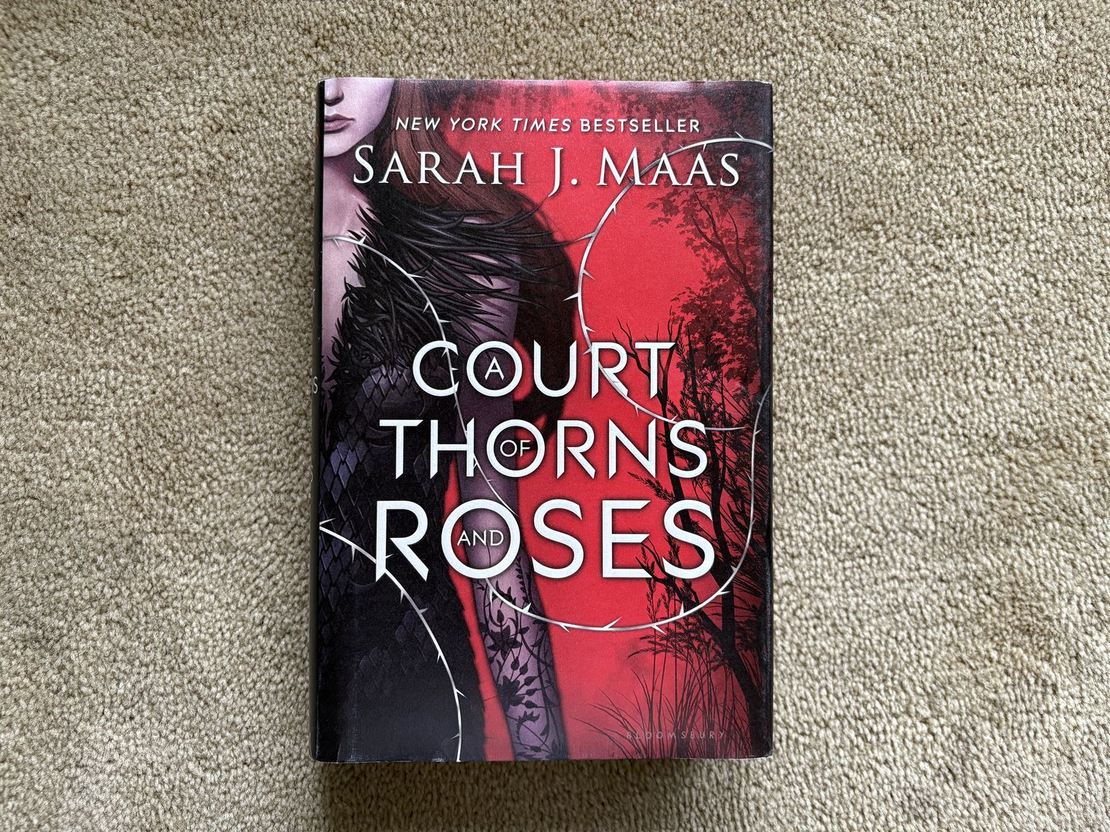 A Court of Thorns and Roses, by Sarah J. Maas (first edition hardcover)