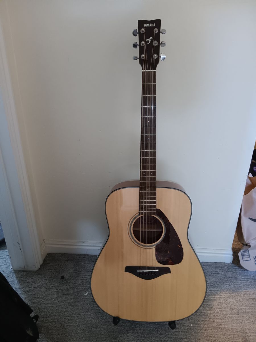 Yamaha FG700S acoustic with Gator case.
