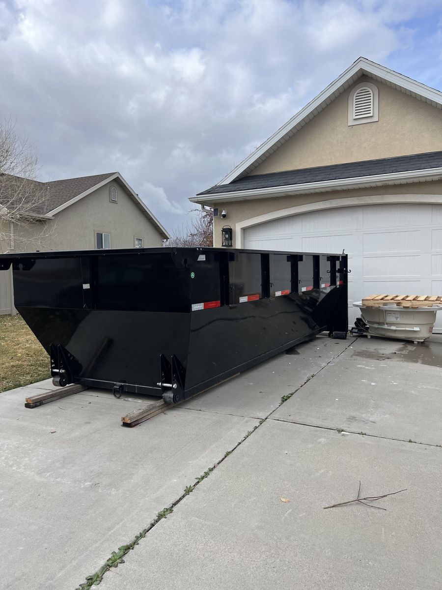 Text or call us for a free estimate/15 yard dump trailer.