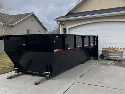Text or call us for a free estimate/15 yard dump trailer.