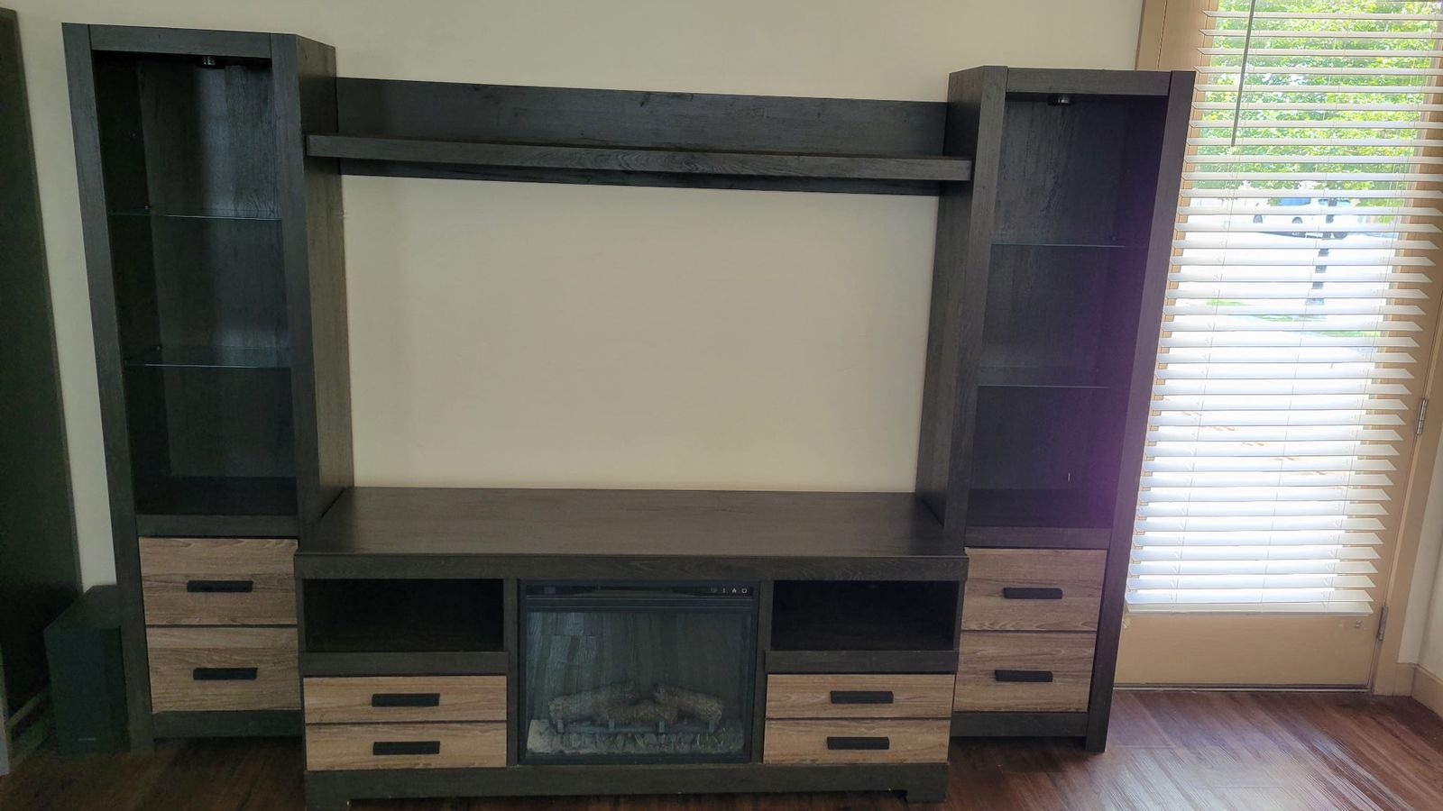 Large Entertainment Center with Electric Fireplace and Storage Towers