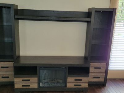 Large Entertainment Center with Electric Fireplace and Storage Towers