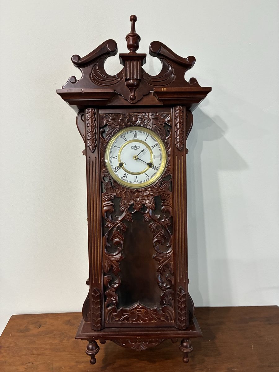 Vintage Wooden Wall Clock with Ornate Carved Detailing and Roman Numerals
