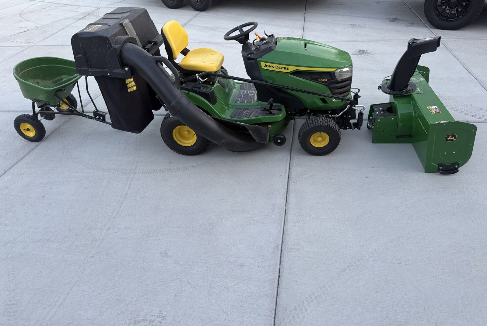 John Deere S120 42in 22hp riding tractor with bagger, snowblower, & spreader